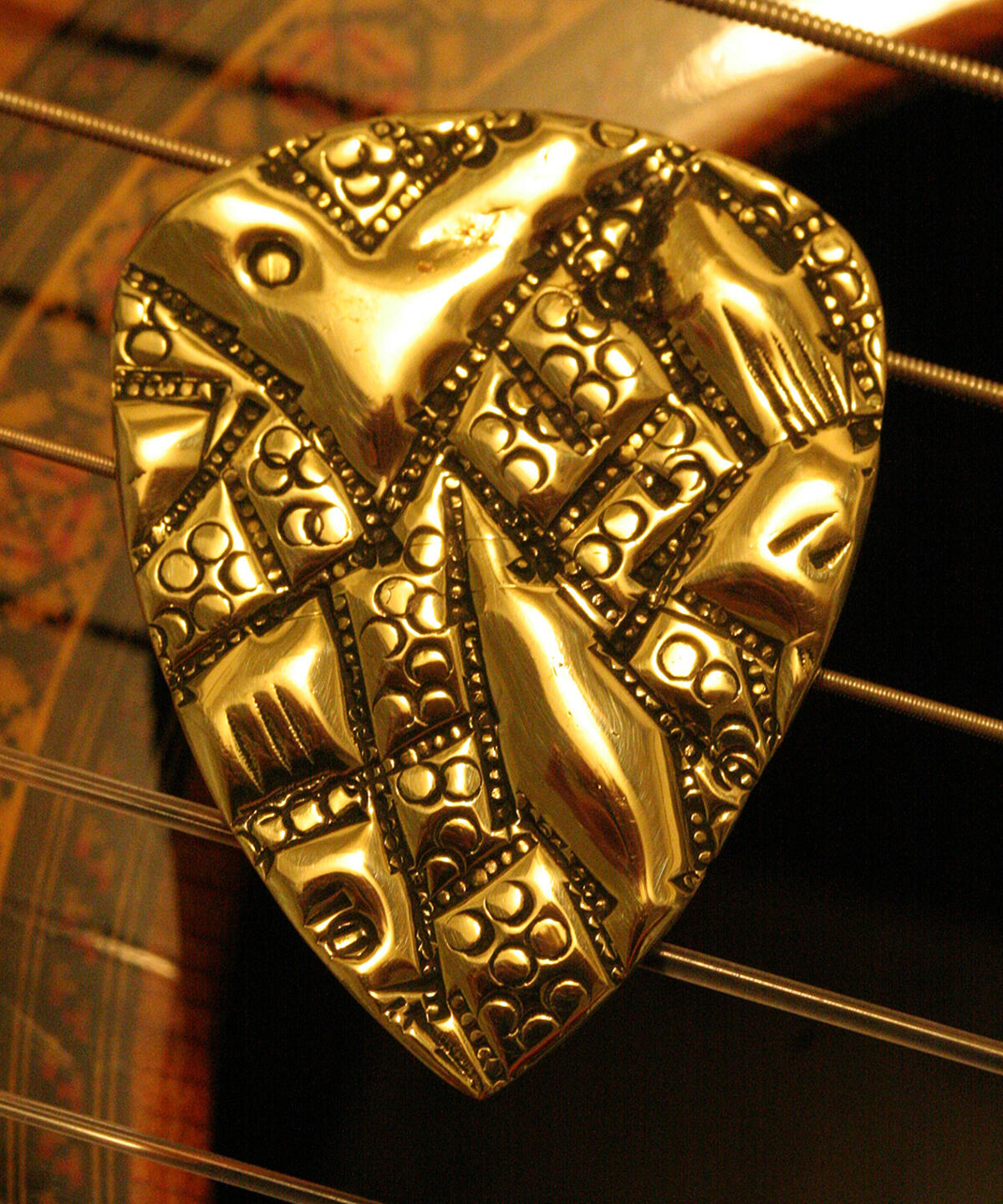 Brass Metal Guitar Pick created by a picksmith